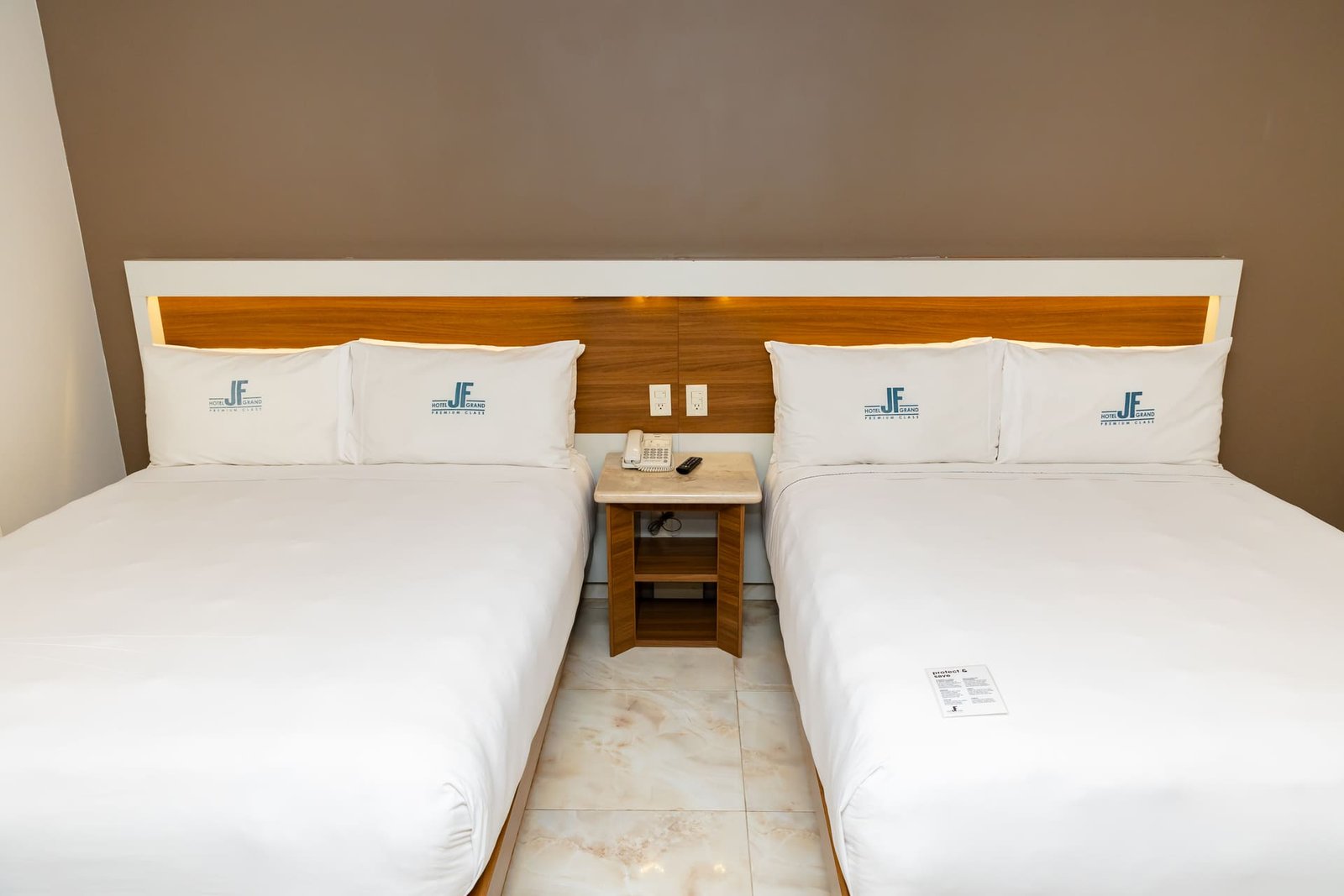 Camas de la Habitación Encanto Esencial en Hotel JF Grand Puebla